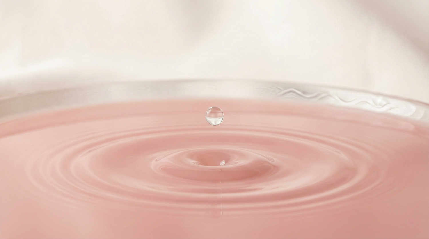 Premium clitoral suction and air pulse stimulator styled in a luxury wellness setting, designed for touch-free intimate pleasure.