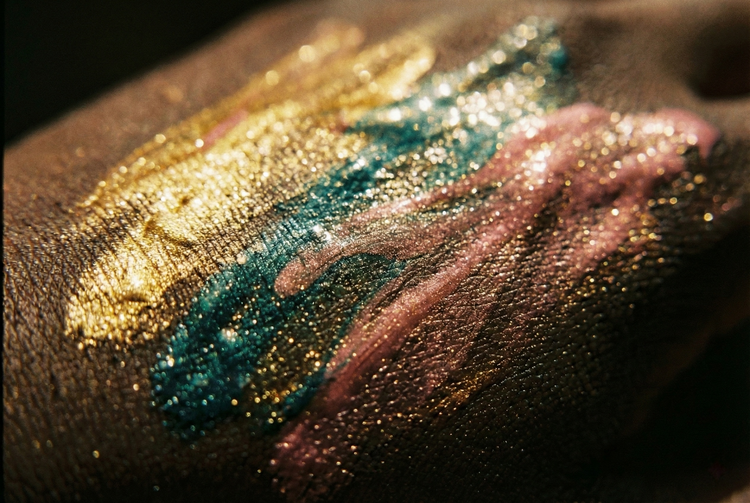 Edible body paint and chocolate pens for sensory play, featuring delicious flavours and brushes, styled as luxury dessert accessories.