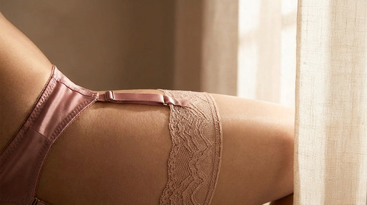 Detail of elegant lingerie accessories and garter belt