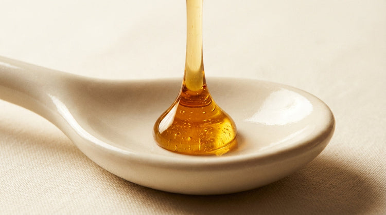 Texture shot of edible intimacy oil in a minimalist setting