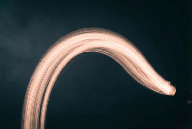 Premium leather floggers and riding crops for impact play, featuring genuine leather tails and ergonomic handles, styled in a luxury BDSM setting.