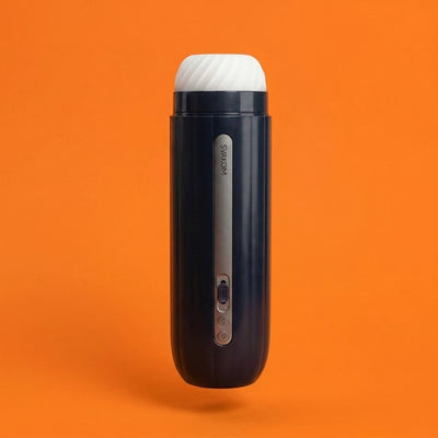 Black and white electronic device on an orange background