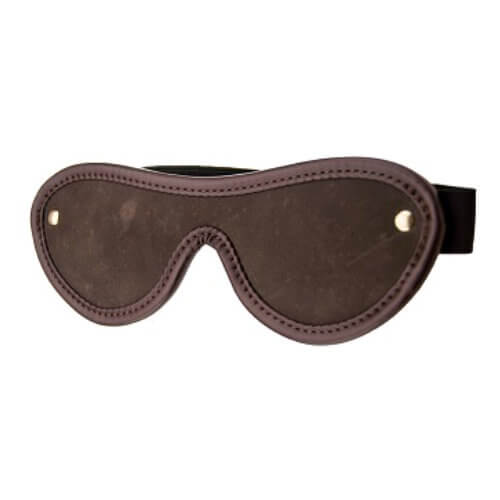 Brown leather eye mask on a white background