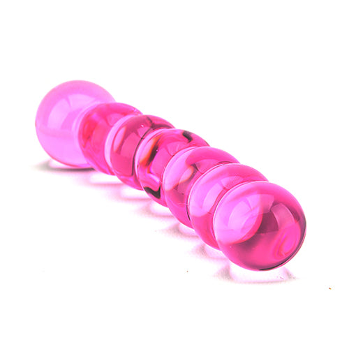 Pink glass tool on a white background